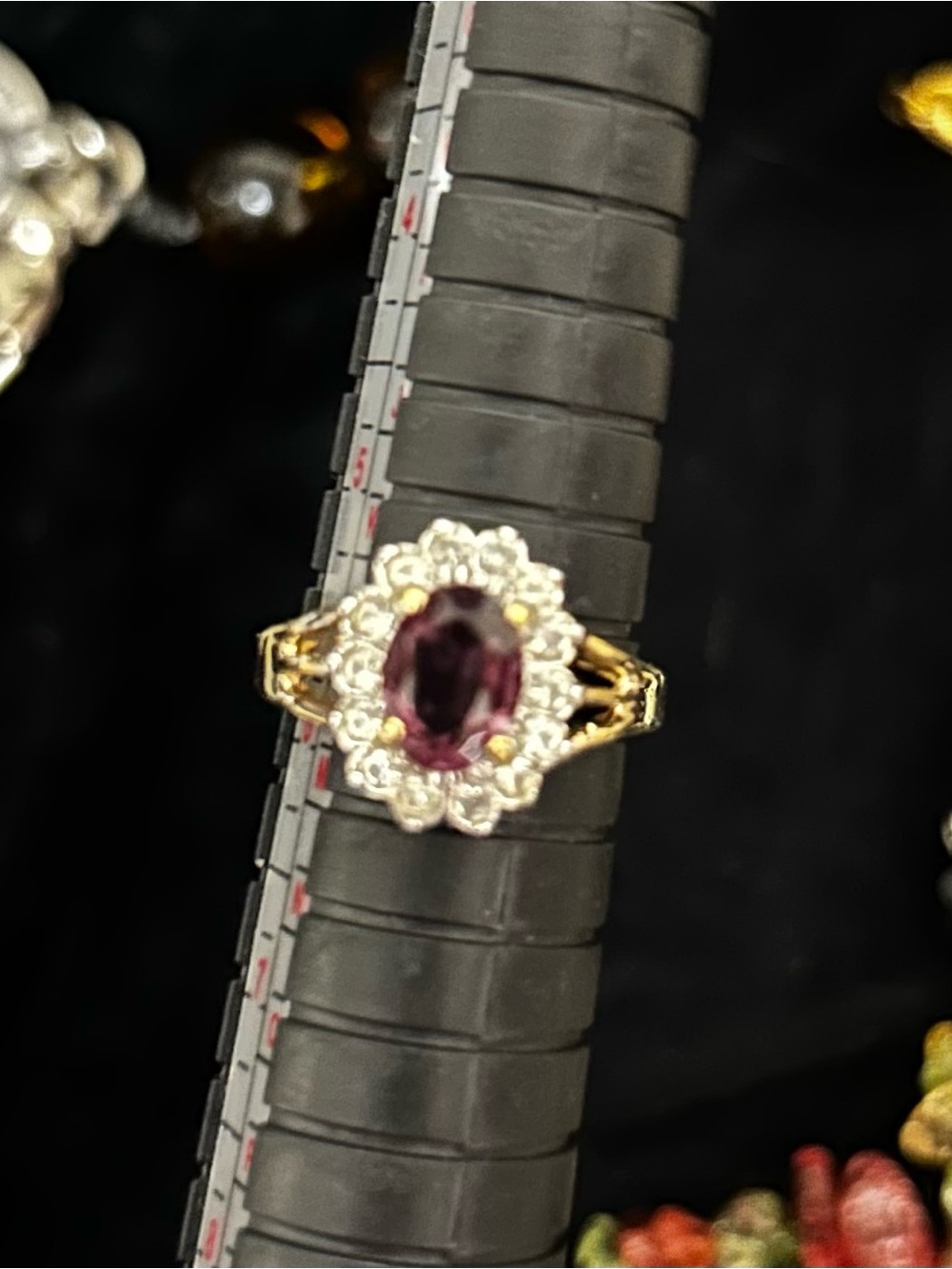Gold-Plated Ring with Purple Center Stone and Halo Accents